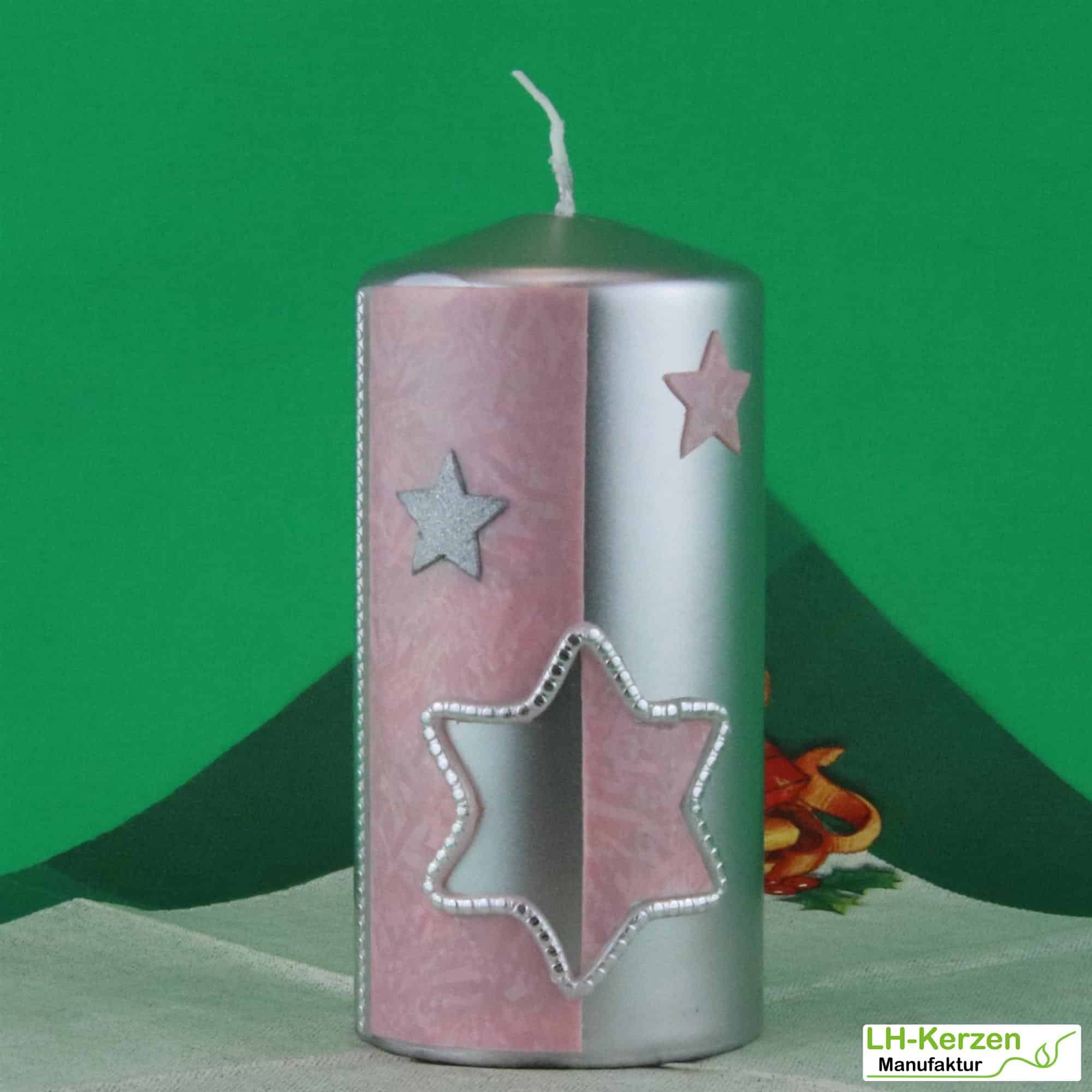 Silberne Weihnachtskerze mit rosafarbigem Stern